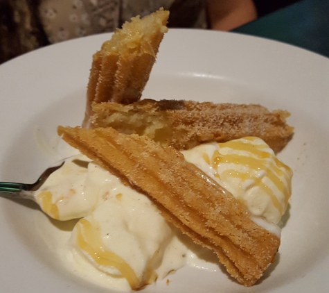 Ink Eats & Drinks - Sacramento, CA. Churro with vanilla ice cream and caramel drizzle